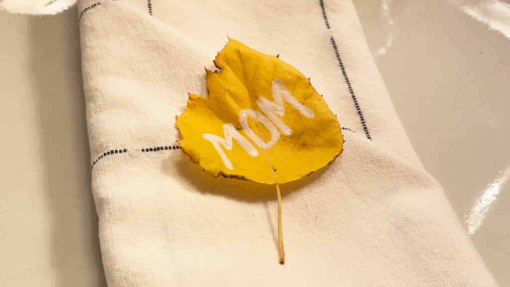 Parkland Pillar Birch leaf used as place card with "mom" written on it